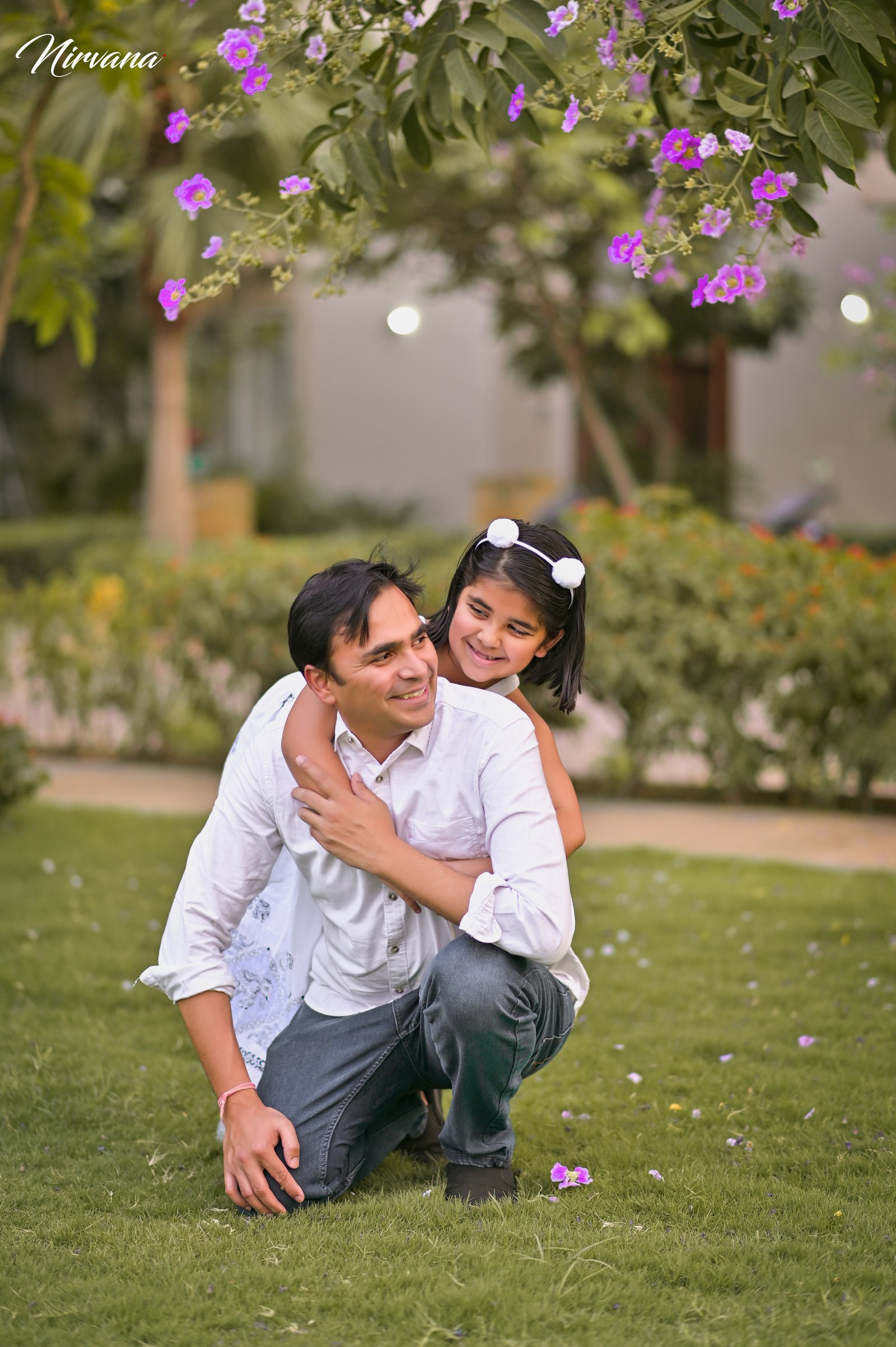 Warm family portrait with baby by Nirvana Photography, image 7