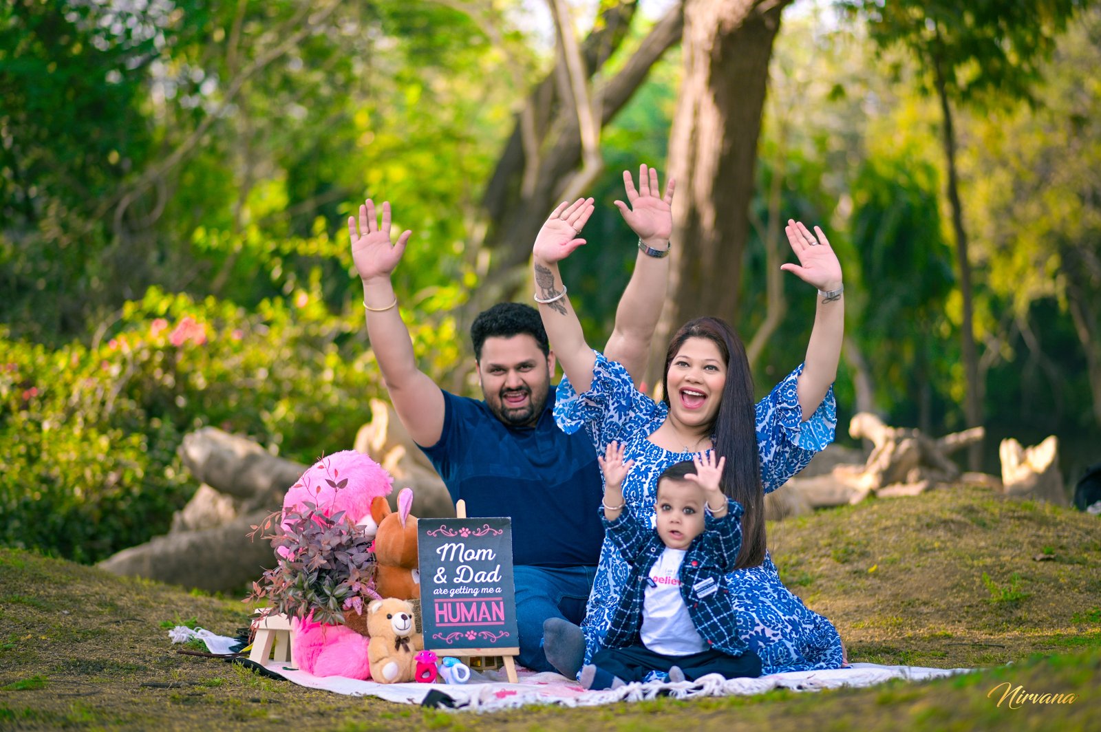Parents and baby sharing a joyful family portrait moment