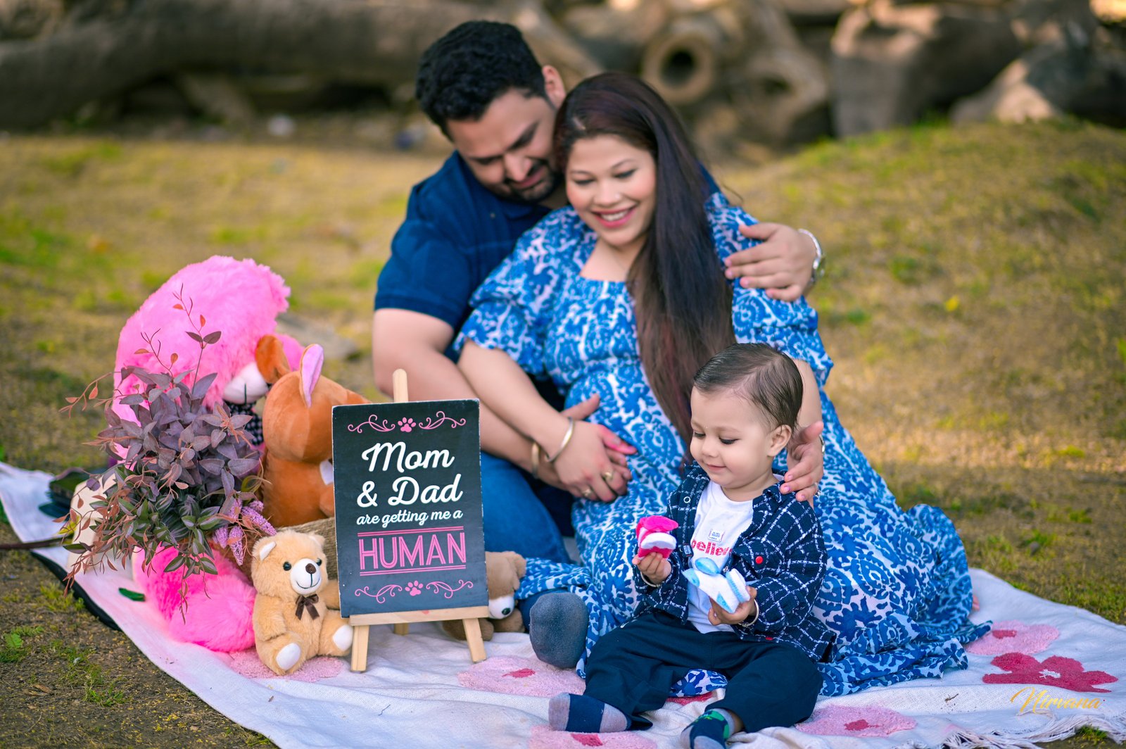 Parents sharing a joyful outdoor moment with their baby Parents sharing a joyful outdoor moment with their baby
