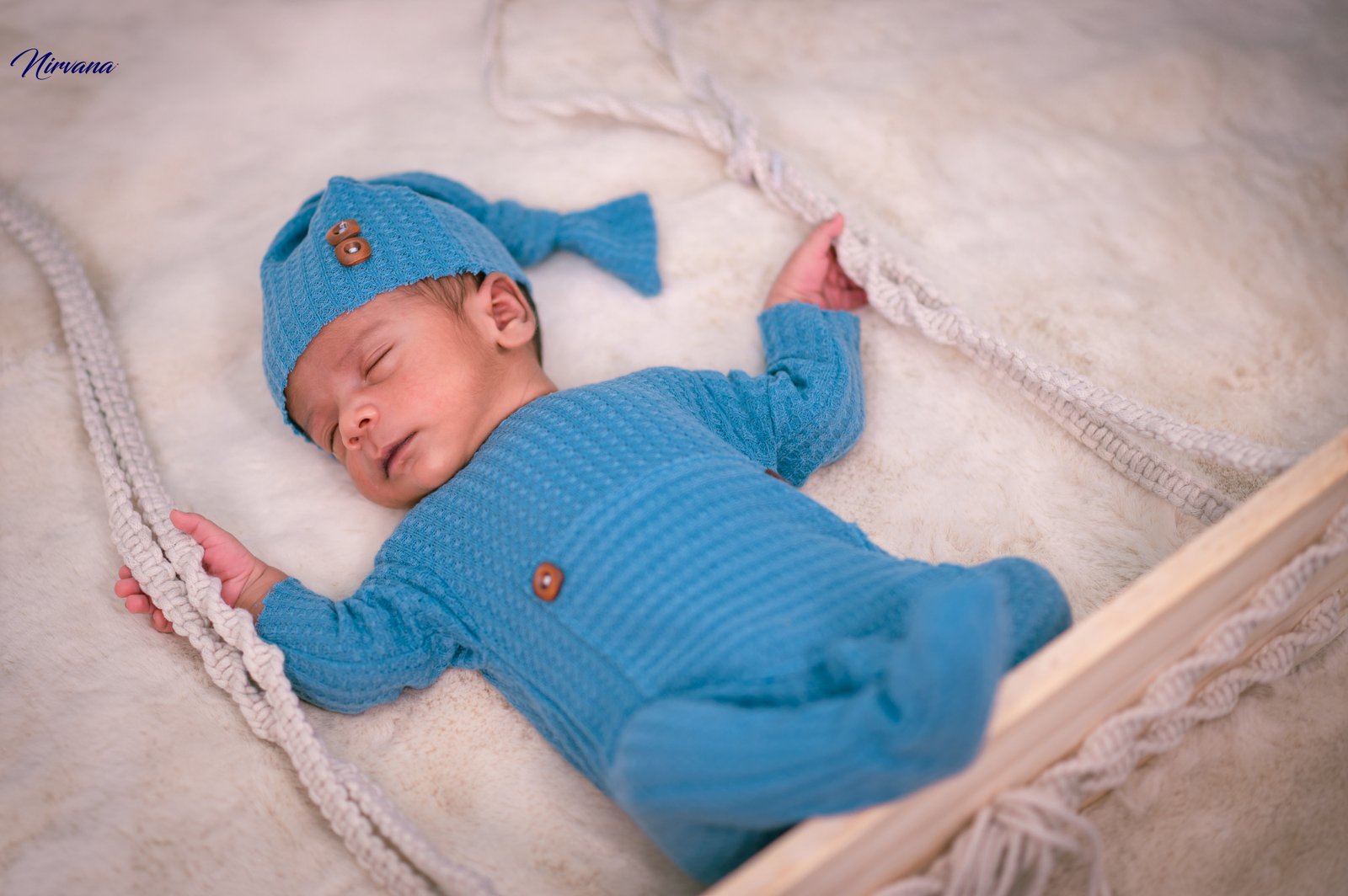 Gently styled newborn portrait by Nirvana Photography, image 11